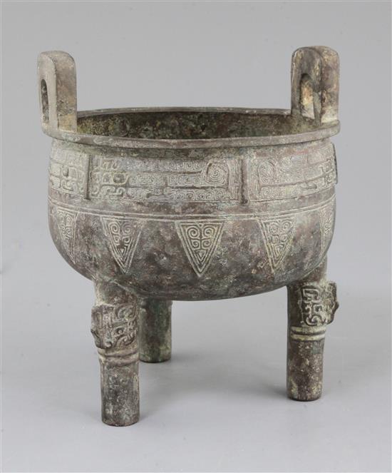 A Chinese archaistic bronze tripod ritual food vessel, Ding, early Western Zhou dynasty style, 19cm high, 16cm wide